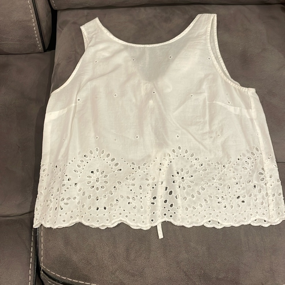 Perforated white sleeveless back tie tank. H&M. Size 6.